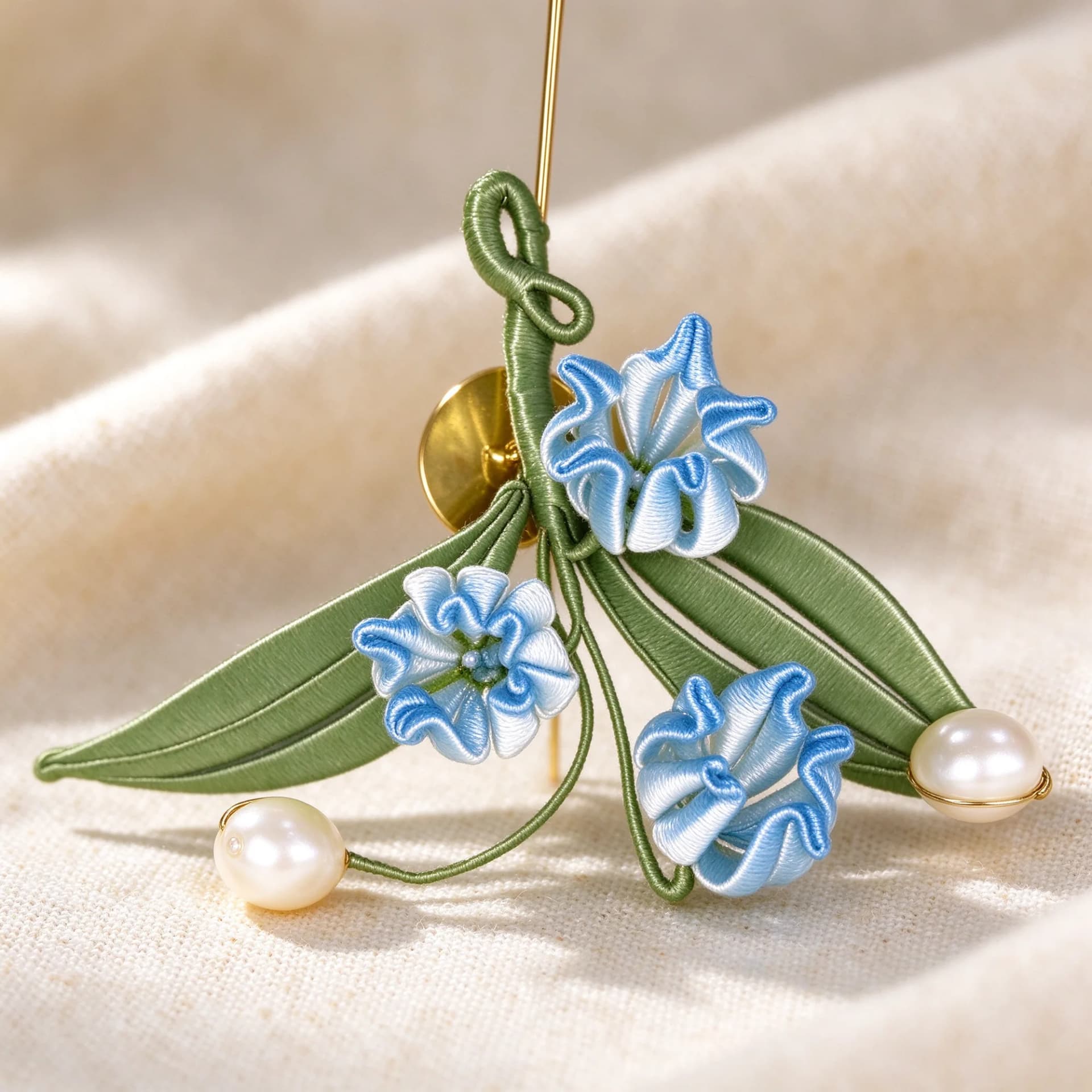 Close-up detail of the Chanhua lily of the valley brooch kit